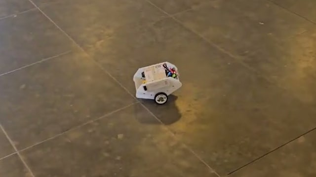 The REGBOT two-wheeled self-balancing robot balancing upright on the lab floor